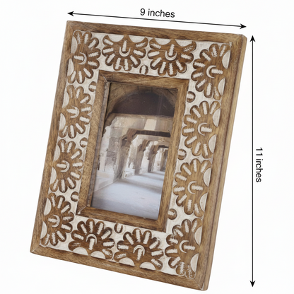 Decorative wooden photo frame with floral patterns and measurements on a white background
