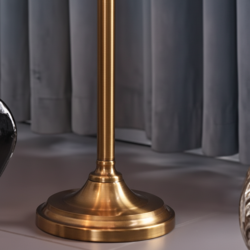 Decorative stand with a spherical object on a neutral background