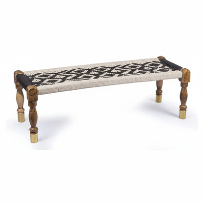 Wooden bench with patterned cushion on a white background