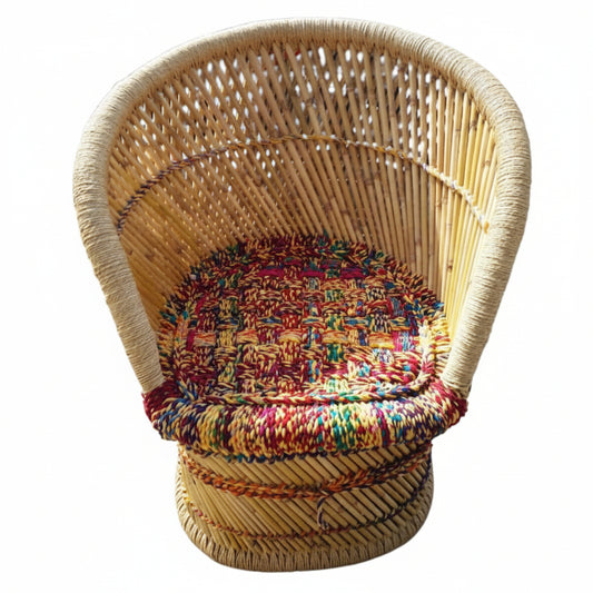 Wicker chair with a colorful cushion on a white background