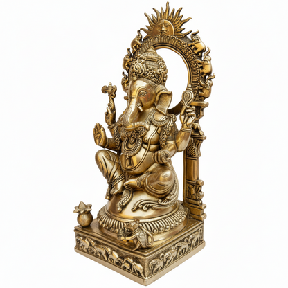Decorative statue of a deity with intricate details on a white background