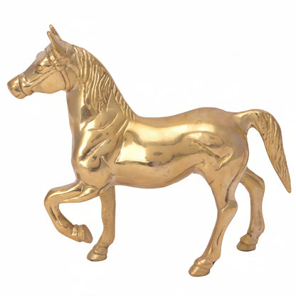 Gold horse figurine on a white background