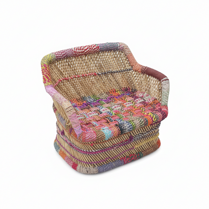 Woven chair with colorful pattern on a white background