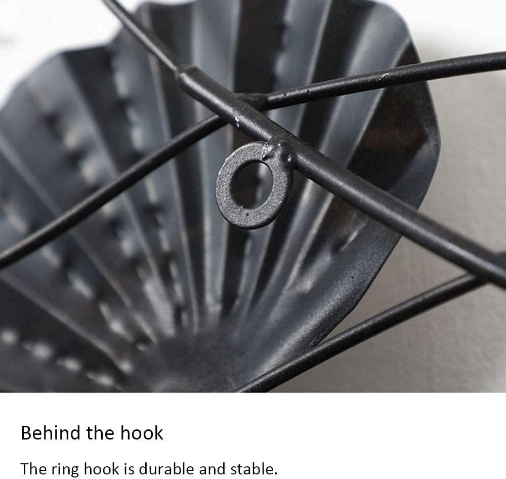 Close-up of a black metal hook with text describing its durability and stability.