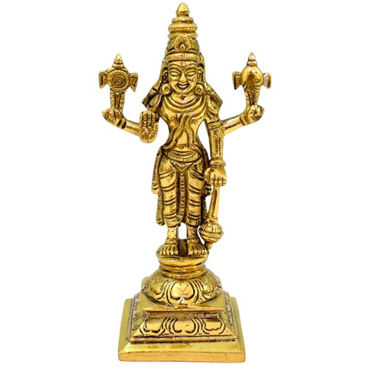 Gold-colored statue of a deity on a white background