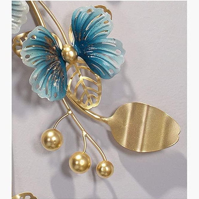 Decorative butterfly with gold and blue colors on a gray background