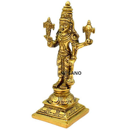 Gold-colored statue of a deity on a white background