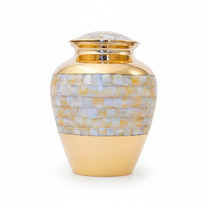 Gold and mosaic-patterned urn on a white background