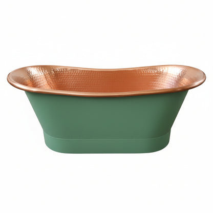 Copper and green freestanding bathtub on a concrete floor.