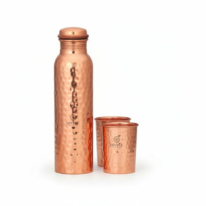 Copper water bottle and cups with 'Divine' branding on a white background