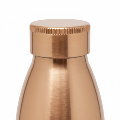 Rose gold water bottle with cap on a white background