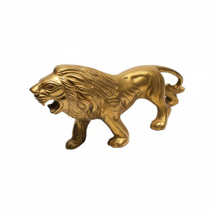 Bronze lion statue on a white background