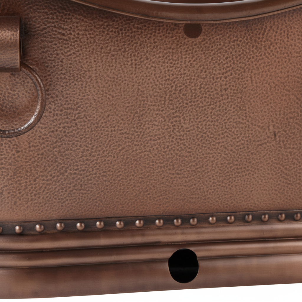 Close-up of a brown leather bag with studded detail