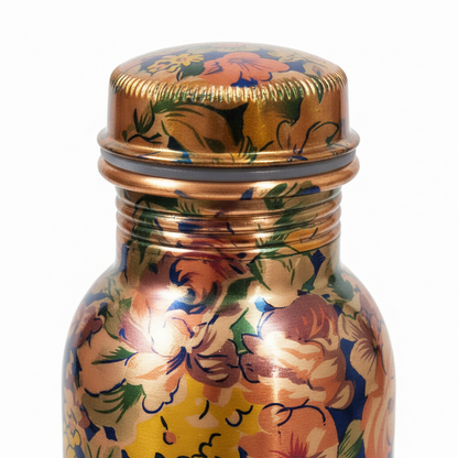 Decorative bottle with floral patterns on a white background