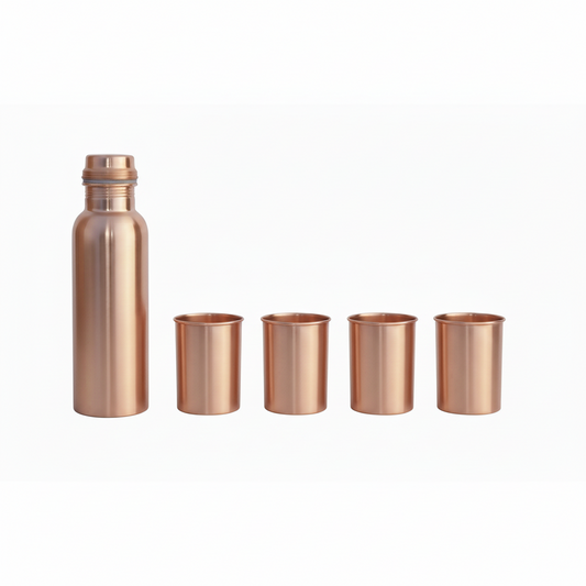 Copper water bottle and four cups on a white background