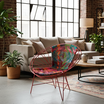 Colorful chair in a modern living room with a sofa and plants.