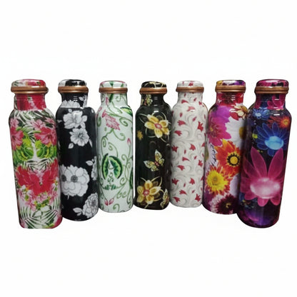 Set of colorful patterned bottles on a white background