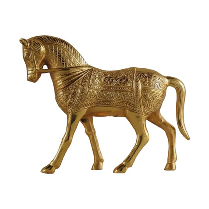 Decorative gold horse figurine on a white background