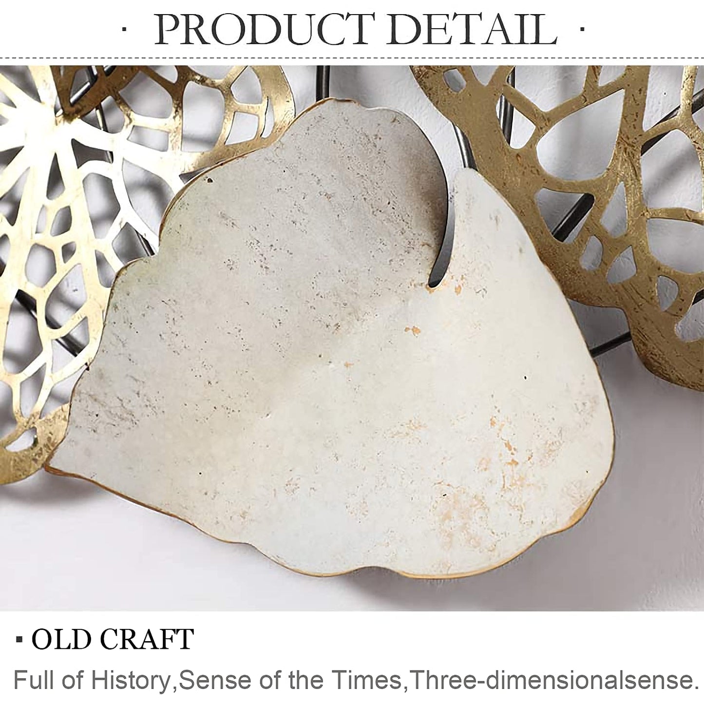 Decorative wall piece with a heart-shaped stone and gold leaf design on a white background