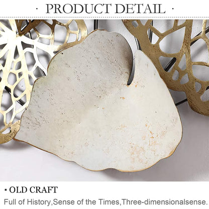 Decorative wall piece with a heart-shaped stone and gold leaf design on a white background