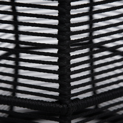 Close-up of black woven basket with white interior