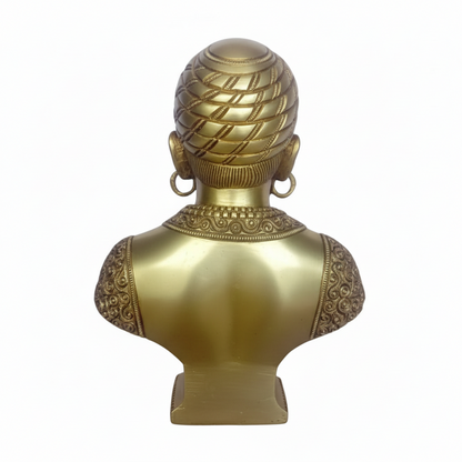 Gold bust sculpture on a white background
