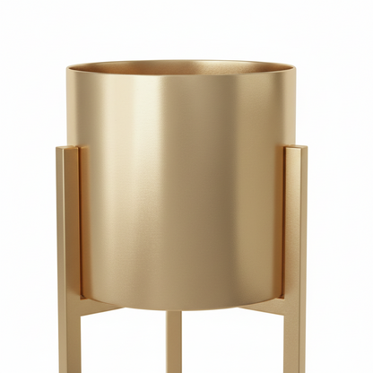 Gold metal planter with stand on a white background