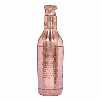 Copper bottle with a textured design on a white background