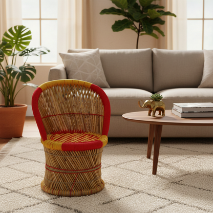 Wicker chair with red accents in a living room setting