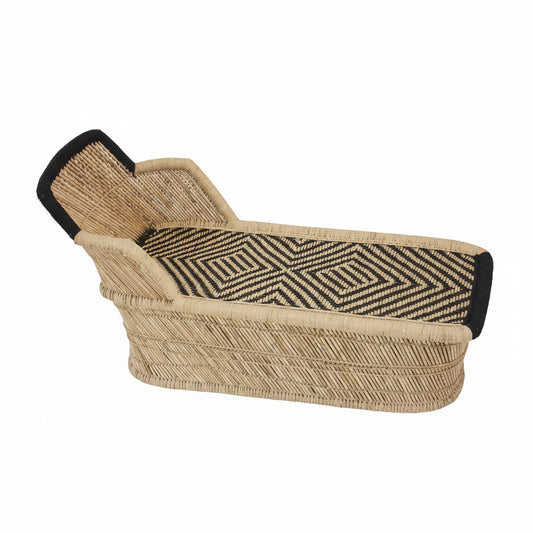 Woven chair with geometric pattern on a plain background