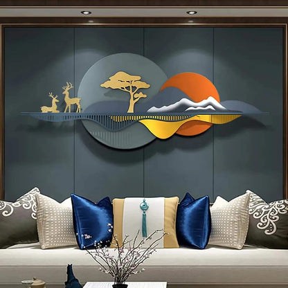 Decorative wall art with nature elements on a dark wall above a sofa with patterned cushions.