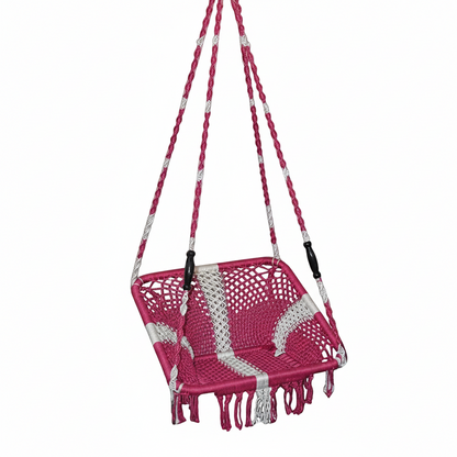 Pink and white hanging chair in a modern indoor setting with plants and a glass wall.