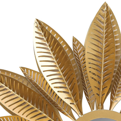 Gold leaf decorative item on a white background