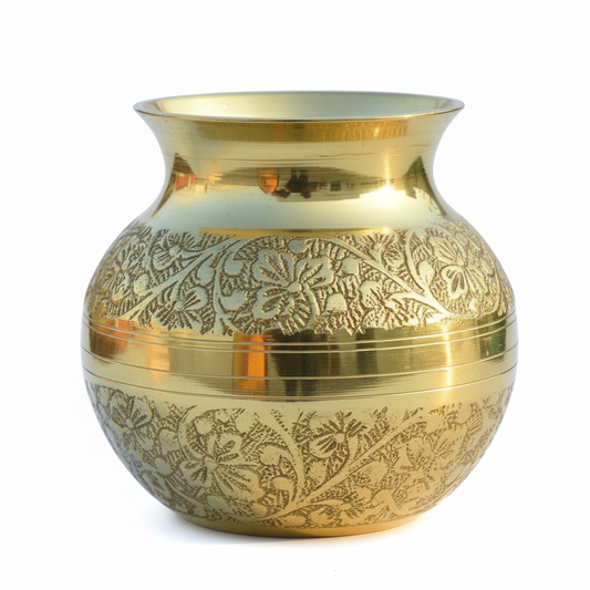 Gold vase with intricate patterns on a textured surface