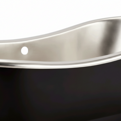 Close-up of a metallic rim on a black background