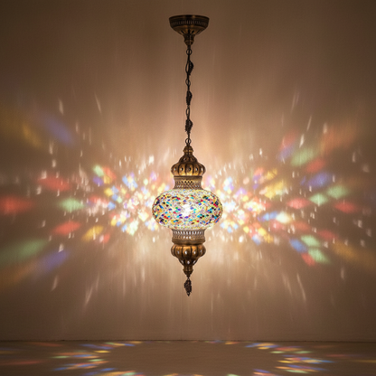 Decorative hanging lamp with colorful mosaic design against a dark background