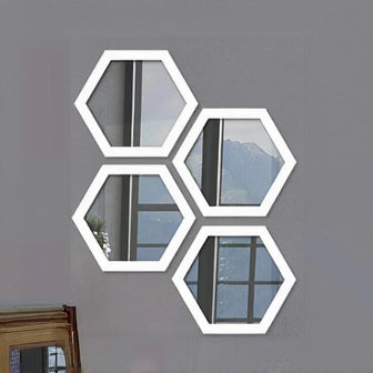 Hexagonal wall mirrors on a gray wall