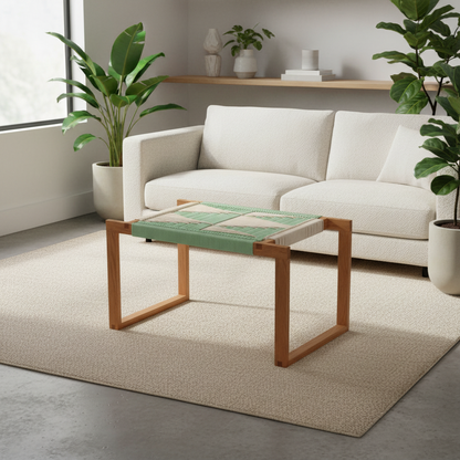 Modern living room with a white sofa, wooden coffee table, and potted plants.