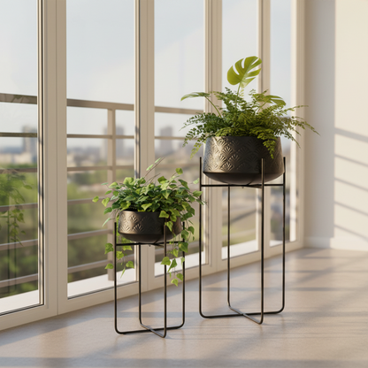Two black metal plant stands with potted plants in a modern room with large windows.
