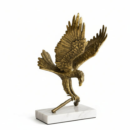 Bronze eagle sculpture on a white marble base