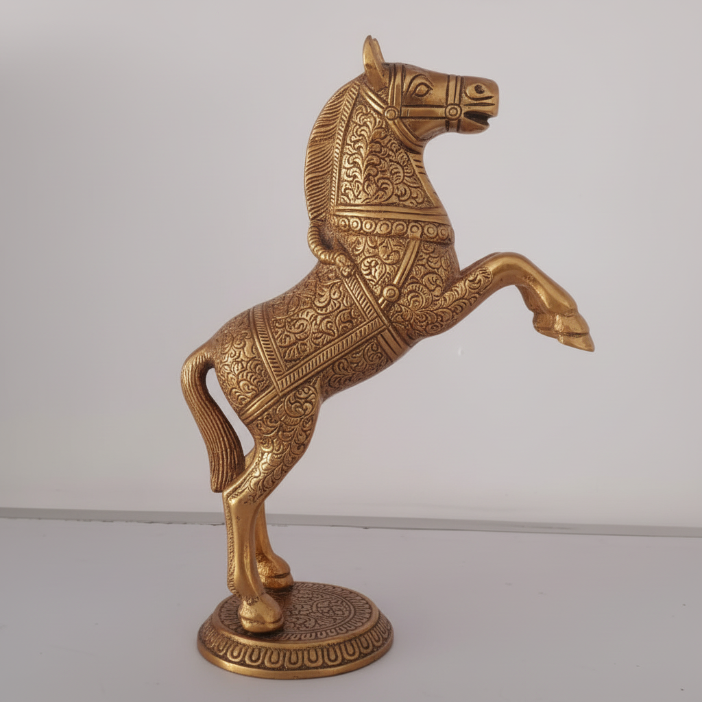 Decorative bronze horse statue on a plain background