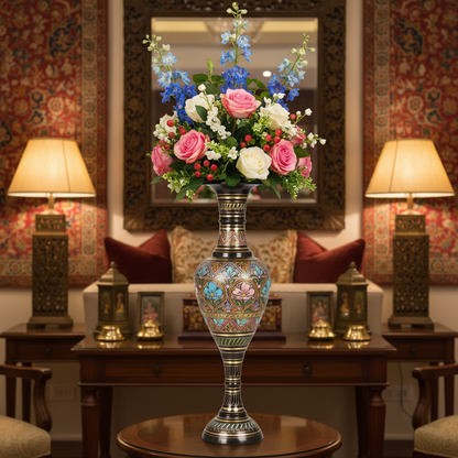 Decorative vase with flowers on a table in a room with ornate walls and lamps.