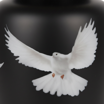 Black vase with a white dove design on a black background