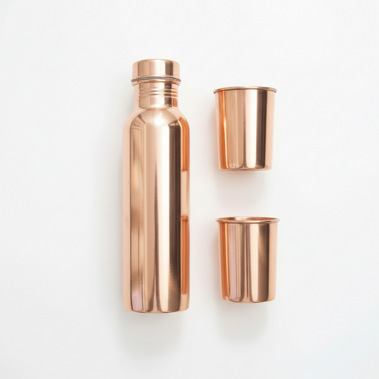 Copper water bottle and two cups on a white background