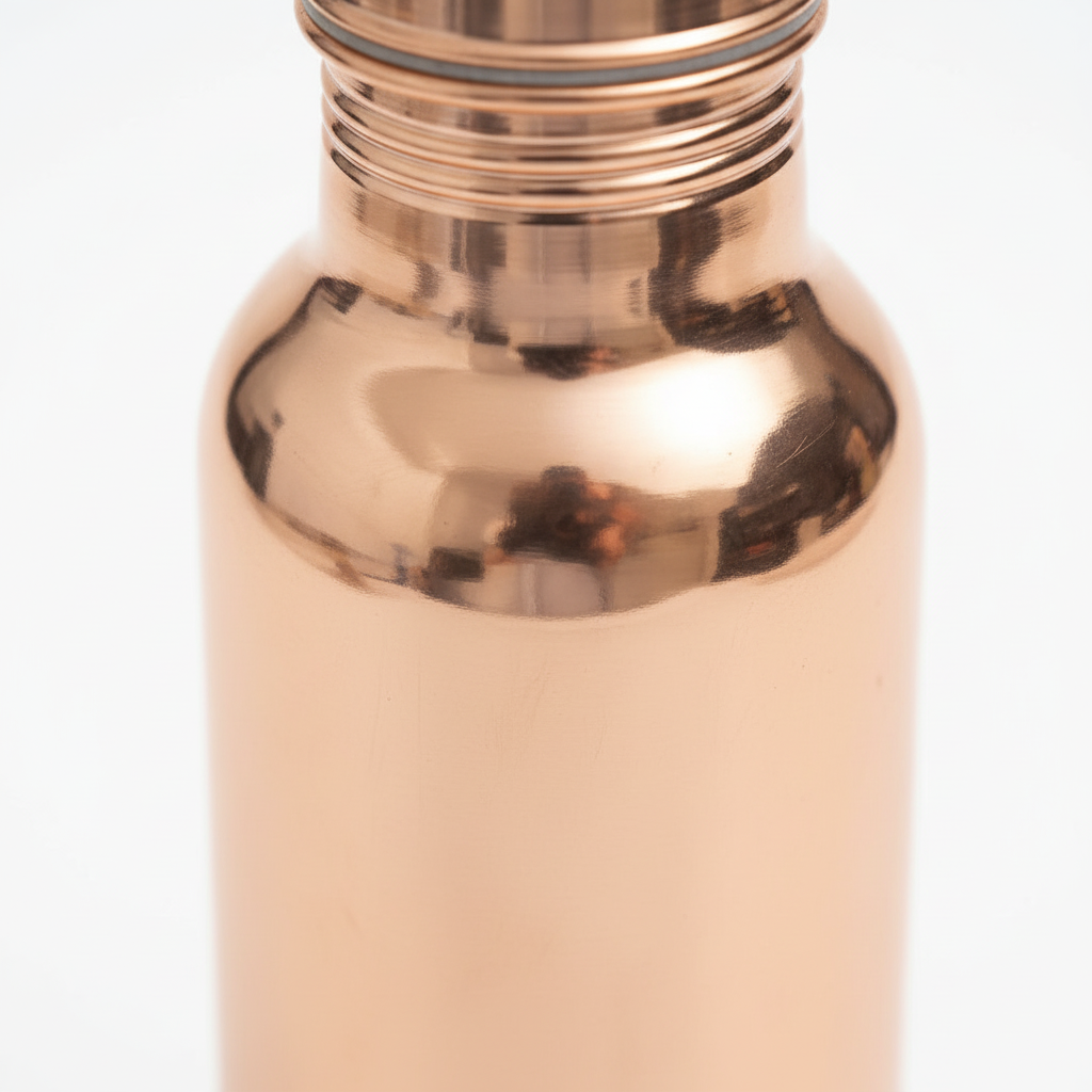 Copper water bottle with a white background