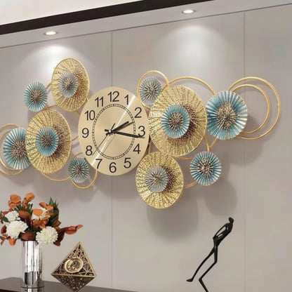 Decorative wall clock with floral designs on a white wall