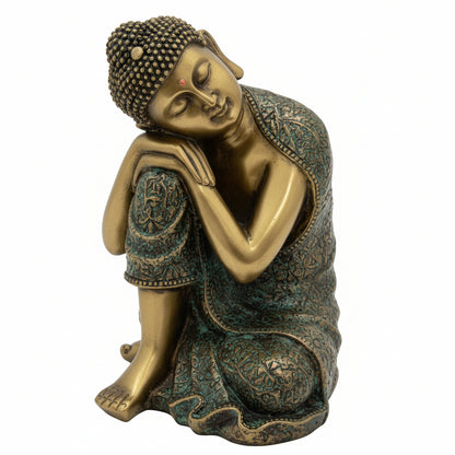 Bronze-colored Buddha figurine with a serene expression on a white background