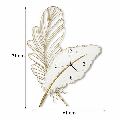 Decorative wall clock with feather design and measurements on a white background