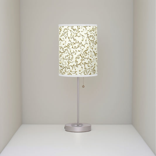 Table lamp with decorative lampshade on a white background
