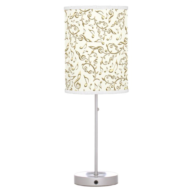 Decorative table lamp with a patterned shade on a white background